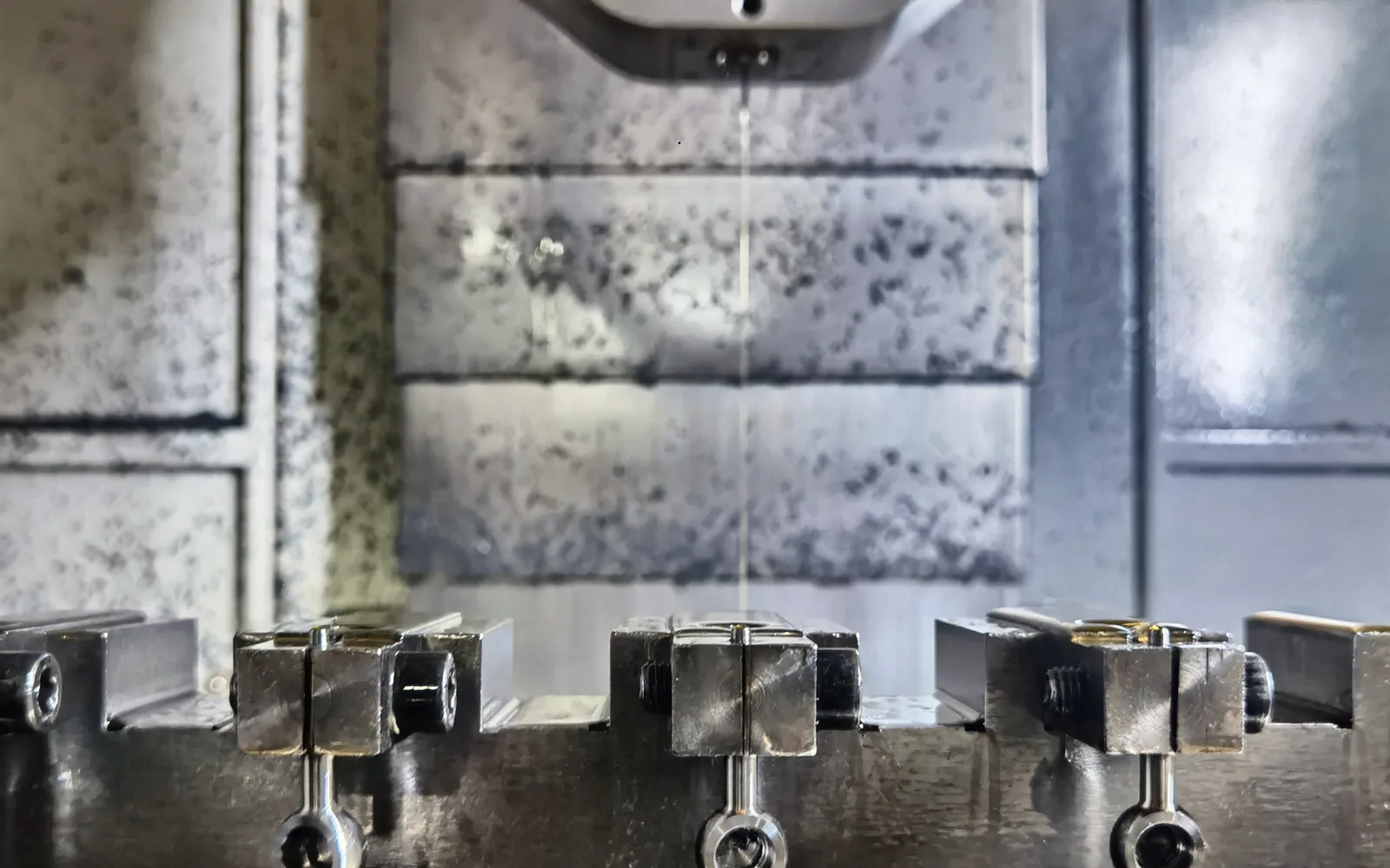 Connection components held in machining fixtures