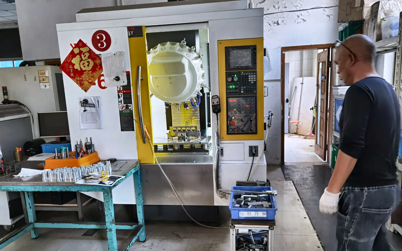 Operator working at a component-production machine