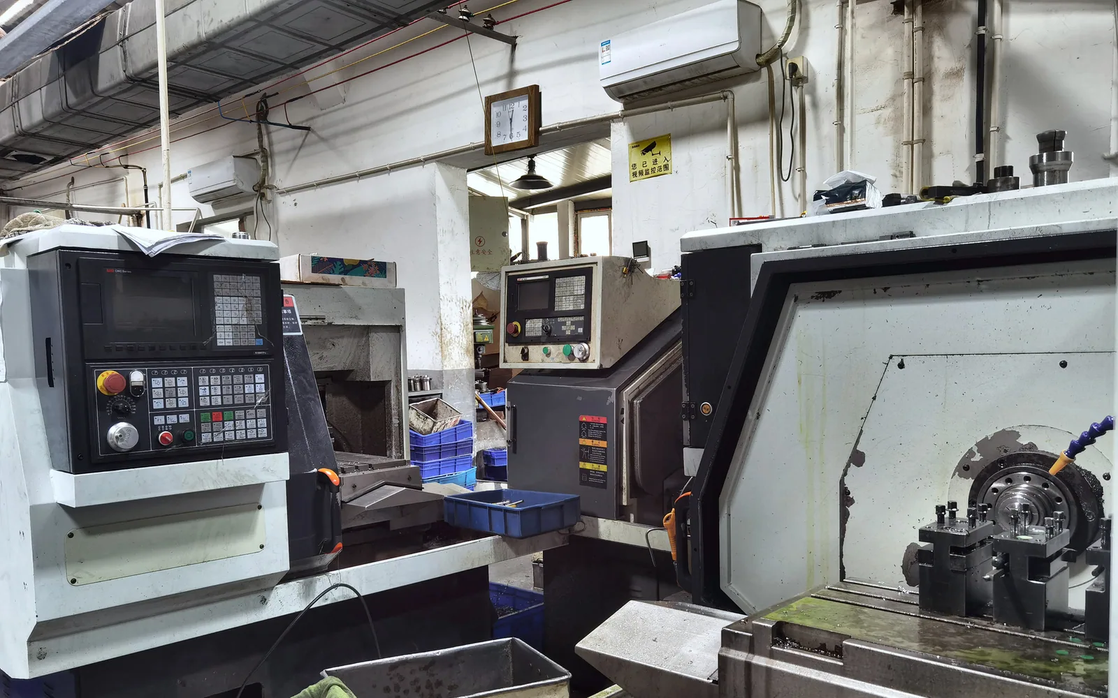 Multiple CNC machining stations in the Z-VINE workshop